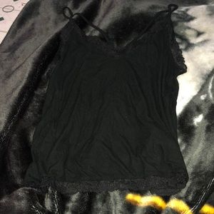 Cross on front lacing shirt